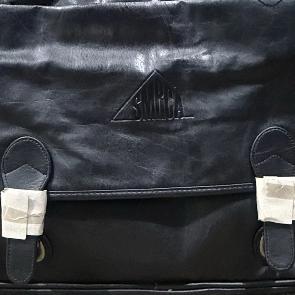 HIGHLAND‎ II Series Noir Executive Travelware Black Faux Leather Duffel Bag